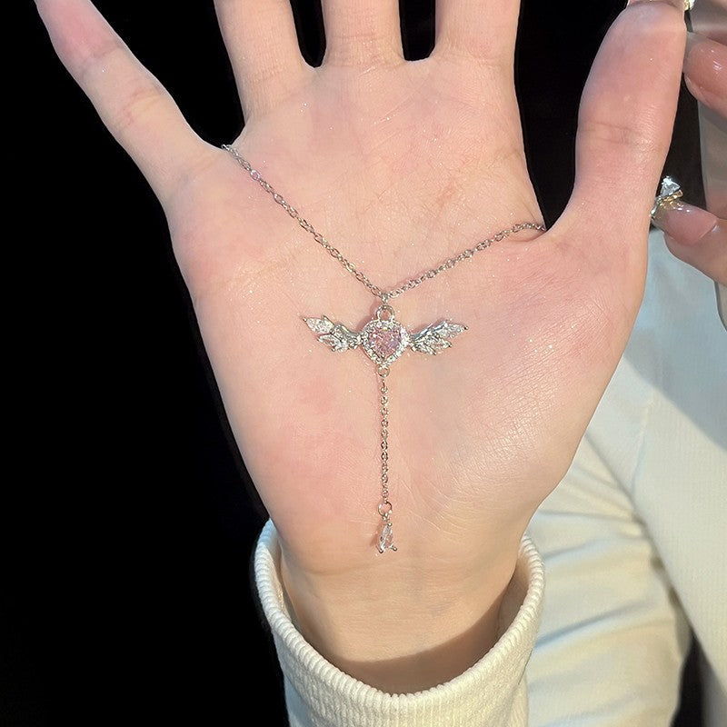 Ogrlica z roza diamanti in angelskim srcem