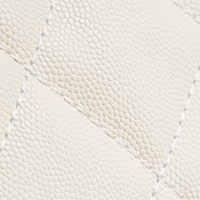 Torba na ramo z velikim žepom iz pravega usnja in vzorcem kaviarja