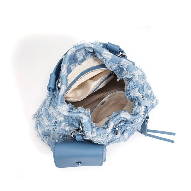 Ženska torba čez telo iz pravega usnja in jeansa v barvnih blokih.