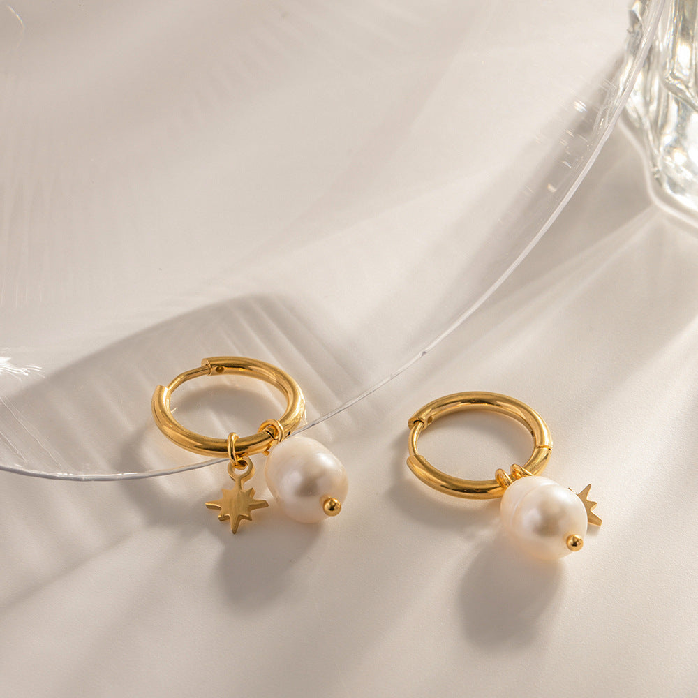 Uhani iz naravnih sladkovodnih biserov z obeski v obliki zvezde