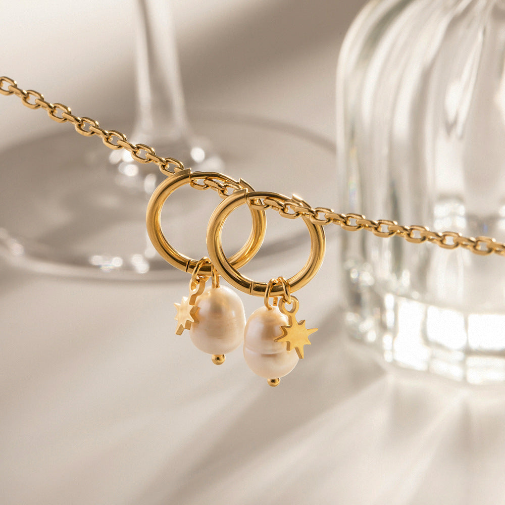 Uhani iz naravnih sladkovodnih biserov z obeski v obliki zvezde