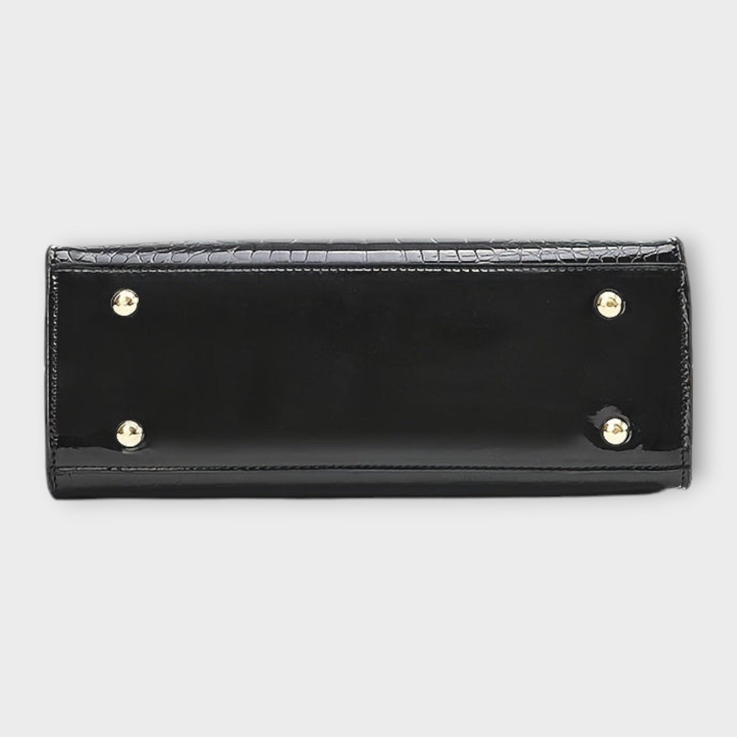 Cecile. - Sijajna torbica z vzorom krokodila