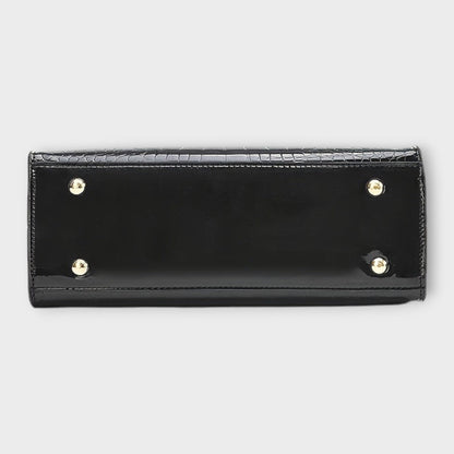 Cecile. - Sijajna torbica z vzorom krokodila