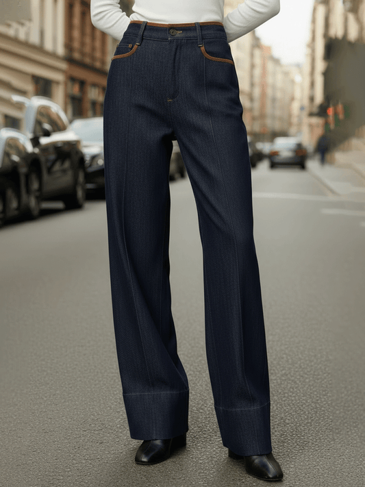 Temno modre jeans hlače s širokimi hlačnicami in kontrastnimi šivi